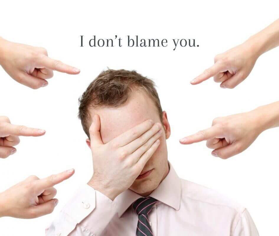 multiple-fingers-pointing-blame-at-man